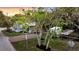 Charming blue home with a well-manicured lawn and mature trees providing a scenic curb appeal at 2530 Jasper Blvd, Sullivans Island, SC 29482
