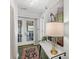 Charming hallway with a stylish rug, elegant console table, and decorative artwork at 2530 Jasper Blvd, Sullivans Island, SC 29482