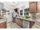 The kitchen includes stainless steel appliances, granite countertops, and ample cabinet space at 2530 Jasper Blvd, Sullivans Island, SC 29482