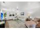 Bright living room with hardwood floors, neutral-toned furniture, and ample natural light at 2530 Jasper Blvd, Sullivans Island, SC 29482