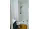 Bathroom featuring a toilet and shower with black fixtures and vinyl flooring at 26 Elmora Ave, Goose Creek, SC 29445