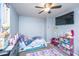 bedroom with turquoise rug, ceiling fan, and cute decor at 3033 Kinswood Ln, Ladson, SC 29456