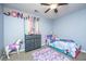 bedroom with Sunshine decor, a small bed, and ceiling fan at 3033 Kinswood Ln, Ladson, SC 29456