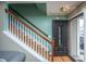 Inviting entryway with hardwood floors, staircase, and stylish front door at 3033 Kinswood Ln, Ladson, SC 29456