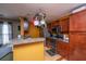 Updated kitchen with stainless steel appliances, wood cabinets and countertop peninsula with seating at 3033 Kinswood Ln, Ladson, SC 29456