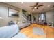 Spacious living room with hardwood floors, comfortable sofas, and a staircase at 3033 Kinswood Ln, Ladson, SC 29456