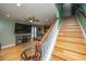 Comfortable living room with hardwood floors, staircase and neutral color palette at 3033 Kinswood Ln, Ladson, SC 29456