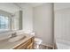 Neutral bathroom featuring a shower and tub combo with showerhead, sink and commode at 315 Indigo Rd, Goose Creek, SC 29445