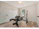 Bonus room with exercise equipment, wood-look floors and double closets at 315 Indigo Rd, Goose Creek, SC 29445