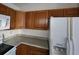 Functional kitchen featuring ample countertop space, wooden cabinets, and modern appliances at 315 Indigo Rd, Goose Creek, SC 29445