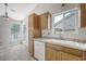 Bright kitchen features stainless sink, tile floors and plenty of cabinet storage and natural light at 315 Indigo Rd, Goose Creek, SC 29445