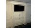 Custom built-in shelving and storage provide elegant and functional space at 330 Concord St # 15C, Charleston, SC 29401
