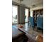 Dining room with water view, large table, shelving, and tile floor at 330 Concord St # 15C, Charleston, SC 29401