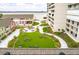 Aerial view of a complex featuring landscaping, green spaces, and water views at 330 Concord St # Th 21, Charleston, SC 29401