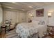 Comfortable bedroom with cottage design elements, wood floors, and a full closet at 330 Concord St # Th 21, Charleston, SC 29401