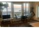 Bright dining area featuring serene water views and comfortable seating for enjoying meals with a view at 330 Concord St # Th 21, Charleston, SC 29401