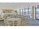 Inviting dining area with ample seating, offering stunning waterfront views and a relaxed atmosphere at 330 Concord St # Th 21, Charleston, SC 29401