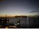 Breathtaking waterfront view at night, featuring a harbor with ships and a lighted bridge at 330 Concord St # Th 21, Charleston, SC 29401