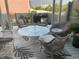 Inviting patio with comfortable seating, a glass table, and stylish outdoor decor at 330 Concord St # Th 21, Charleston, SC 29401