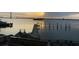 Beautiful waterfront view featuring a pier, bridge, and calm water under a bright sky at 330 Concord St # Th 21, Charleston, SC 29401