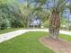 Quaint home nestled among mature trees, showcasing a spacious yard and a welcoming ambiance at 330 Crestwood Dr, Moncks Corner, SC 29461