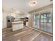 Well-lit kitchen featuring stainless steel appliances, granite countertops, and a convenient kitchen island at 330 Crestwood Dr, Moncks Corner, SC 29461