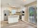 Bright kitchen with white cabinets, granite countertops, stainless steel appliances, and ample counter space at 330 Crestwood Dr, Moncks Corner, SC 29461