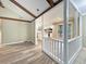 Open living room showcases the updated kitchen, new luxury vinyl plank flooring, and spacious design at 330 Crestwood Dr, Moncks Corner, SC 29461