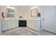 Bathroom featuring double sink vanity, quartz countertop, and decorative wall mirror at 332 Fish Creek Ct, Summerville, SC 29486