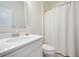 Clean and bright bathroom with a white vanity, chrome fixtures, a mirror, and a shower curtain at 332 Fish Creek Ct, Summerville, SC 29486