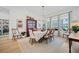 Bright dining room featuring a large table with seating for six, a decorative chandelier and natural light at 332 Fish Creek Ct, Summerville, SC 29486
