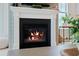 Inviting living space featuring a cozy fireplace with a classic white mantel and elegant decor at 332 Fish Creek Ct, Summerville, SC 29486