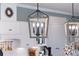 Charming kitchen pendant lighting illuminates this stylishly decorated, bright, modern space at 332 Fish Creek Ct, Summerville, SC 29486