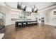 A spacious kitchen with modern appliances and a large island, making it an ideal gathering spot for communal cooking and socializing at 332 Fish Creek Ct, Summerville, SC 29486