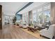 Bright lobby with large windows providing ample natural light, paired with stylish furnishings, offering an inviting community atmosphere at 332 Fish Creek Ct, Summerville, SC 29486