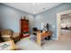 Stylish office area with an ergonomic chair, a sleek wooden desk, and ample natural light at 332 Fish Creek Ct, Summerville, SC 29486