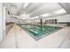 Indoor pool area features clear, clean water, multiple lanes, ample lighting, and accessibility features at 332 Fish Creek Ct, Summerville, SC 29486