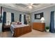 Comfortable bedroom with a coffered ceiling, ample natural light, and modern furnishings at 3424 Henrietta Hartford Rd, Mount Pleasant, SC 29466