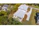 Aerial view of a home featuring a modern roof, deck, landscaping, and long driveway at 3683 Nassas St, Mount Pleasant, SC 29466