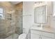 Stylish bathroom with glass enclosed shower, marble vanity, and modern fixtures at 3683 Nassas St, Mount Pleasant, SC 29466