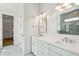 Modern bathroom featuring double sinks, and a separate area with a glass shower at 3683 Nassas St, Mount Pleasant, SC 29466