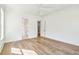 Open bedroom featuring hardwood flooring, great natural light, and ensuite bathroom at 3683 Nassas St, Mount Pleasant, SC 29466