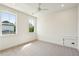 Bright bedroom features neutral carpet, recessed lights, large windows, and ceiling fan at 3683 Nassas St, Mount Pleasant, SC 29466