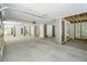 Spacious garage with concrete floor, concrete supports, and wood slat walls at 3683 Nassas St, Mount Pleasant, SC 29466