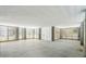 Spacious garage with concrete floor, wood slat walls, white trim and door at 3683 Nassas St, Mount Pleasant, SC 29466