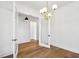 Bright living room with hardwood floors and stylish modern chandelier at 3683 Nassas St, Mount Pleasant, SC 29466