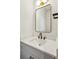 Stylish powder room featuring a white vanity with a black faucet and modern lighting at 3683 Nassas St, Mount Pleasant, SC 29466