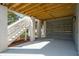 Under deck area with stairs, concrete floor, columns, and garage door at 3683 Nassas St, Mount Pleasant, SC 29466