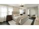 Serene bedroom with soft natural light, elegant furnishings, and a view to the bathroom at 40 Dunnemann Ave, Charleston, SC 29403
