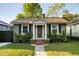 Charming home with landscaped front yard, brick entryway, and inviting front door at 40 Dunnemann Ave, Charleston, SC 29403